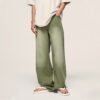Custom Washed Loose-Leg Denim Jeans - Style 684B56 Person wearing washed loose-leg green denim jeans