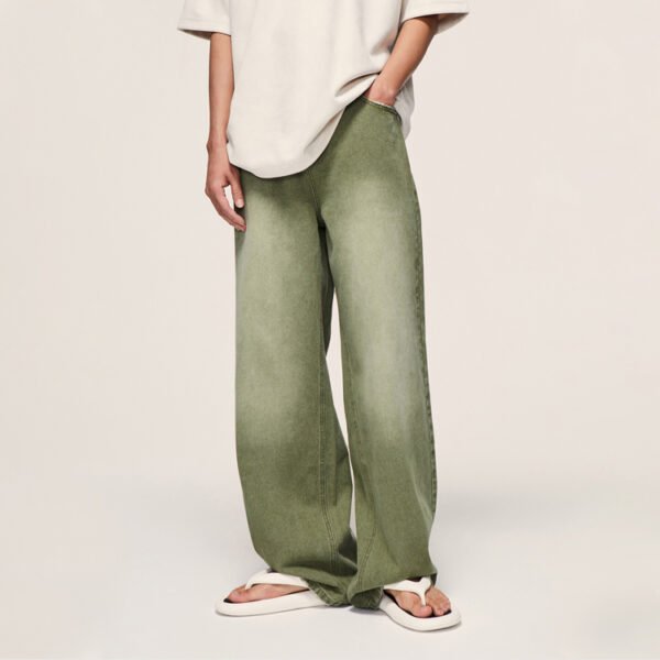 Custom Washed Loose-Leg Denim Jeans - Style 684B56 Person wearing washed loose-leg green denim jeans