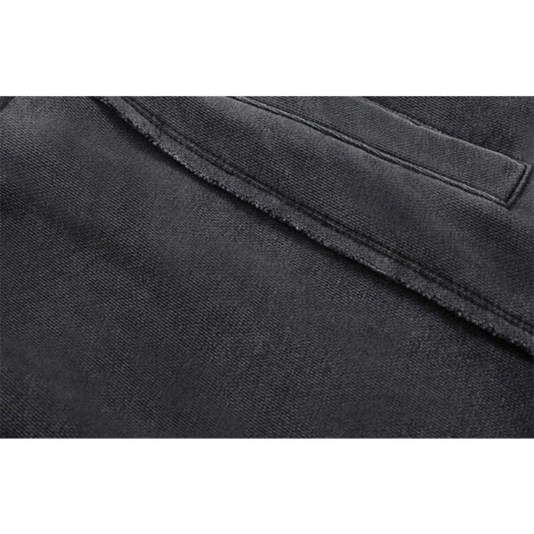 Close-up of dark grey washed straight-leg shorts
