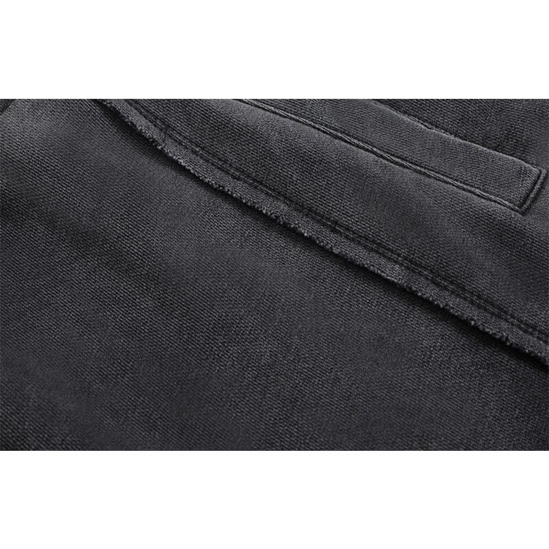 Close-up of dark grey washed straight-leg shorts