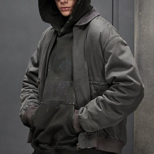 Custom Washed Mobility Bomber Jacket - Style E4AA01 Model wearing a washed mobility bomber jacket over a hoodie
