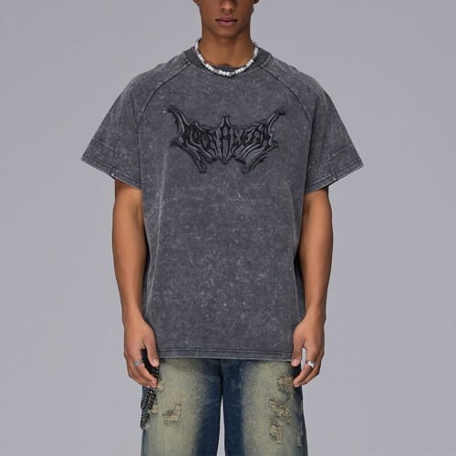 Custom Washed Oversized Graphic T-Shirt - Style B1A136 Grey washed oversized t-shirt with an embossed gothic-style graphic on the front.