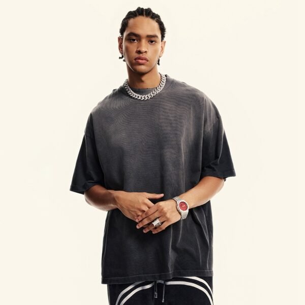 Custom Washed Oversized Tee - 59A73C04 - Style 59A73C Man wearing a dark grey washed oversized t-shirt