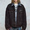 Person wearing a custom washed padded denim jacket