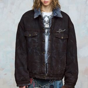 Person wearing a custom washed padded denim jacket