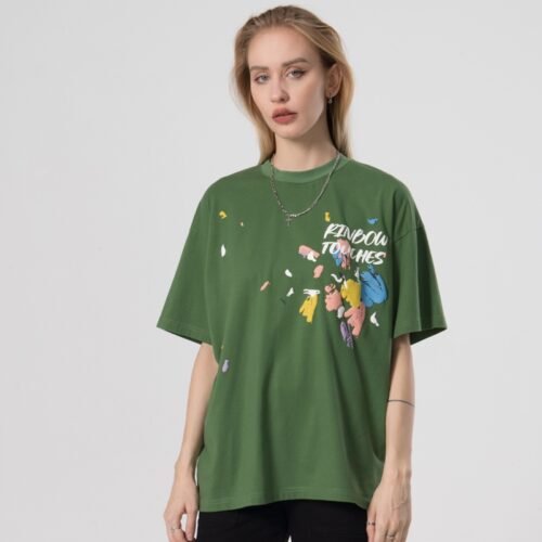 Green oversized t-shirt with puff print graphic and text
