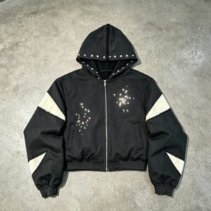 Black washed zip-up hoodie with cream accents and rhinestone stars