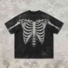 Washed black t-shirt with a detailed skeleton graphic