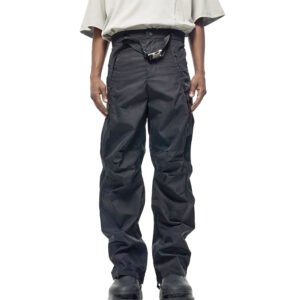 Men's black utility cargo pants with buckled waist and stacked leg detail