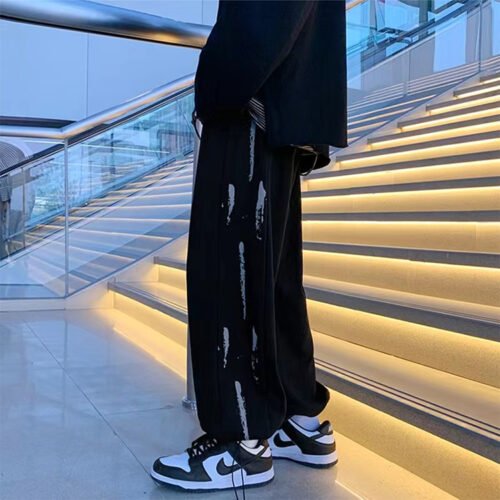 Custom men's wide-leg pants with graphic leg panels