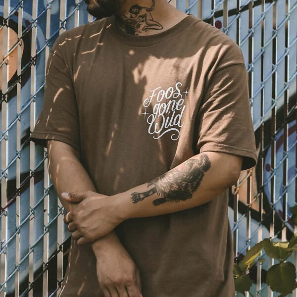 Brown t-shirt with 'Foos gone wild' script graphic on the chest