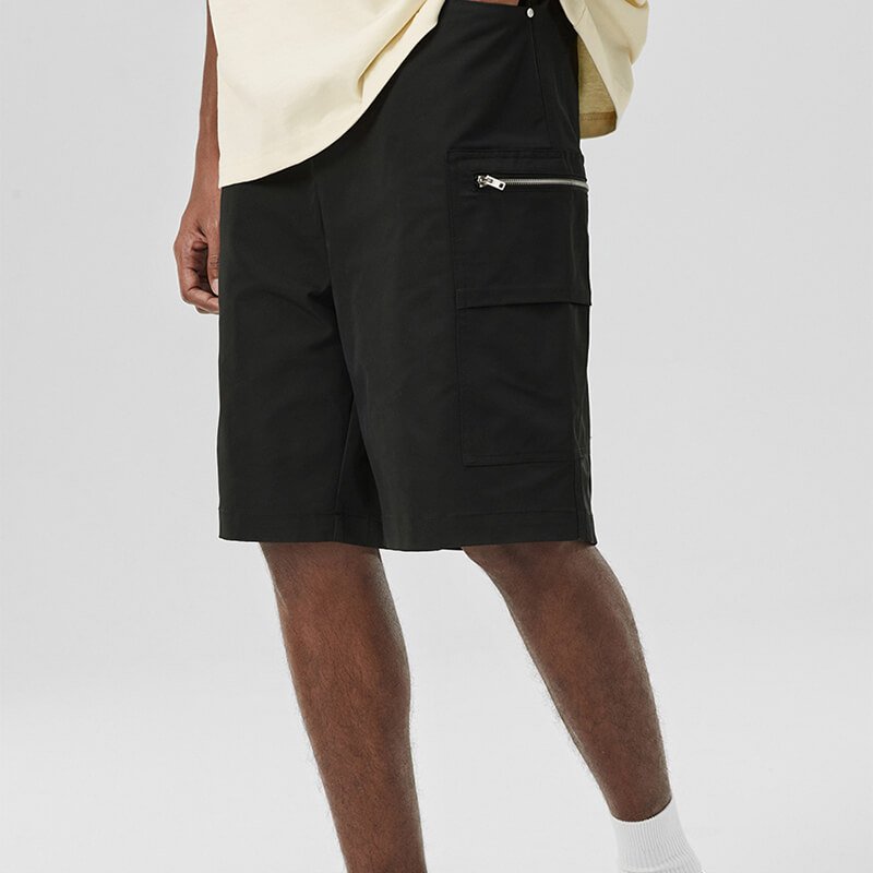 Man wearing custom utility zip-pocket cargo shorts