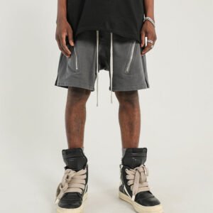 Grey relaxed fit streetwear shorts with zip pockets and drawcord
