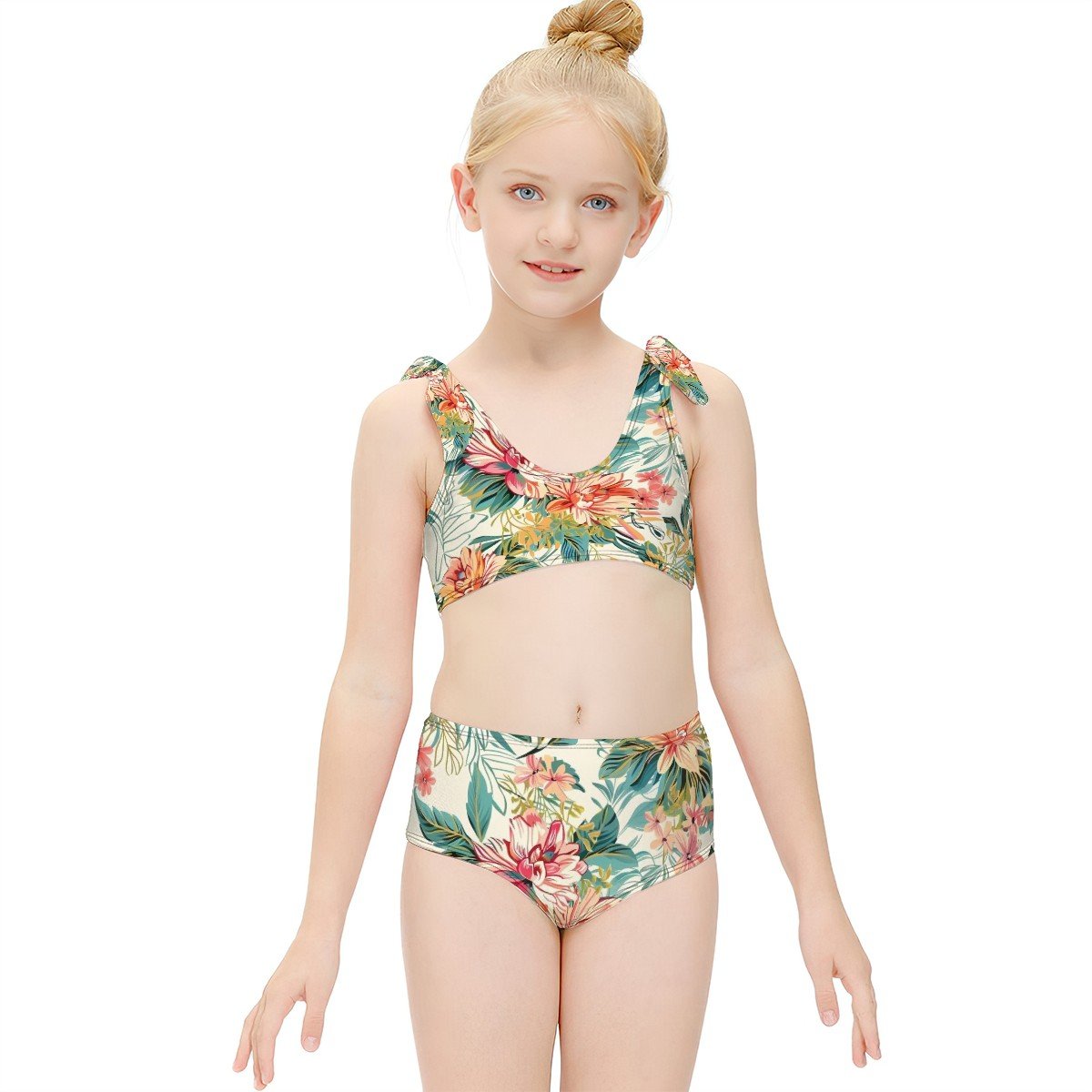 Girl in floral print two-piece swimsuit with tie shoulder straps